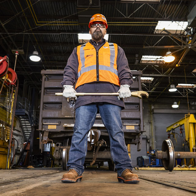 A man wearing the Thunderstruck 10” Waterproof Nano Comp Toe boots in brown.